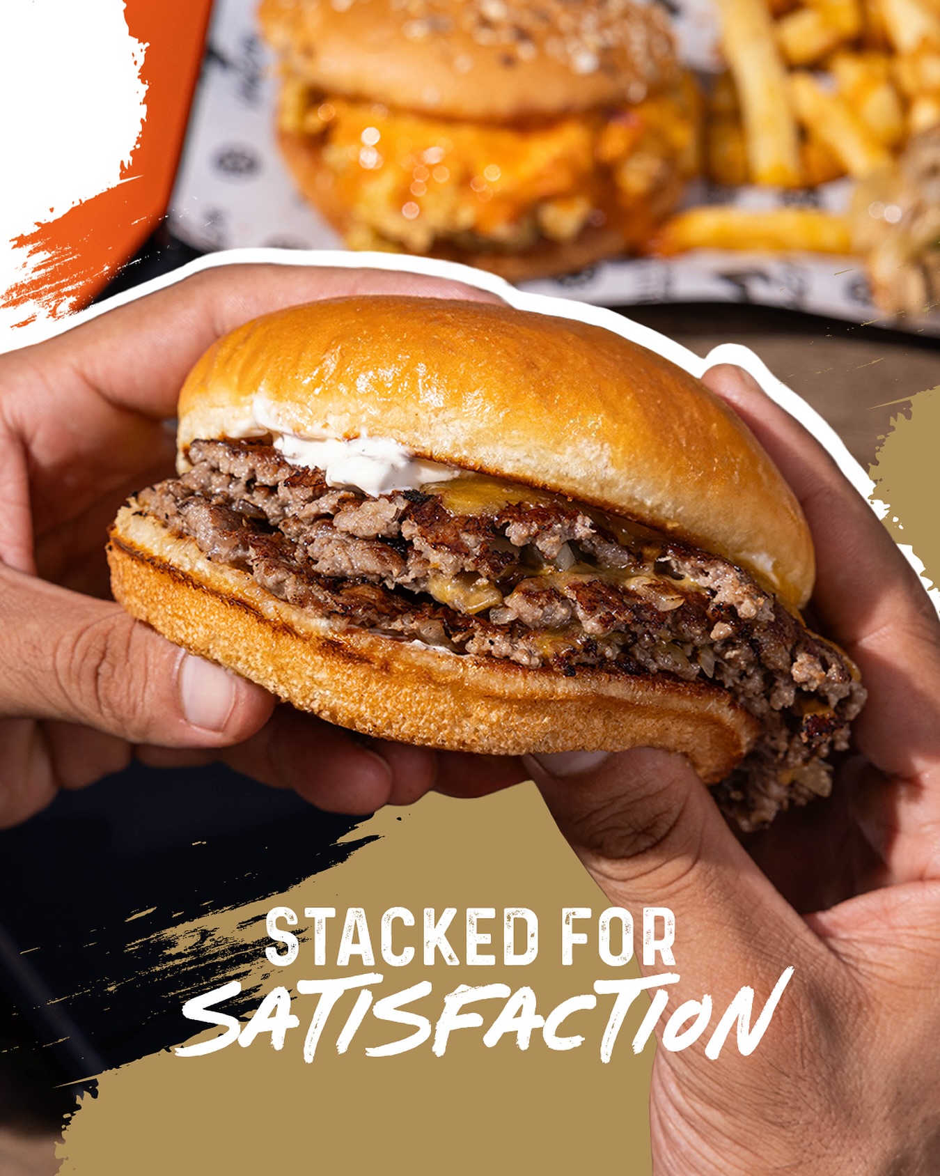 Double cheeseburger with melted cheddar and a side of seasoned fries